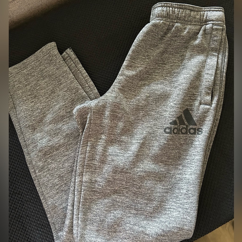 Adidas heather gray sweatpants; size S. Front pockets with zippers.